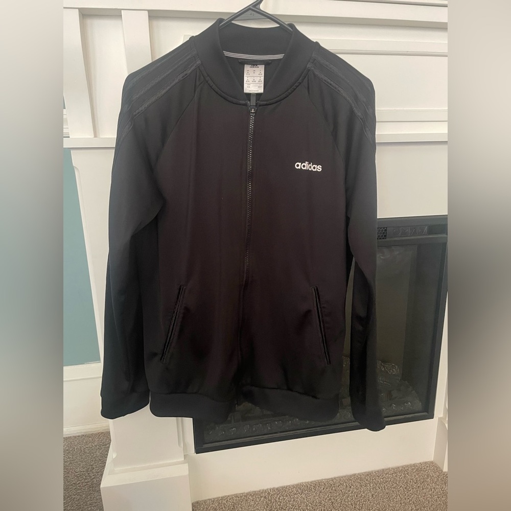 All black women’s adidas track jacket, size medium